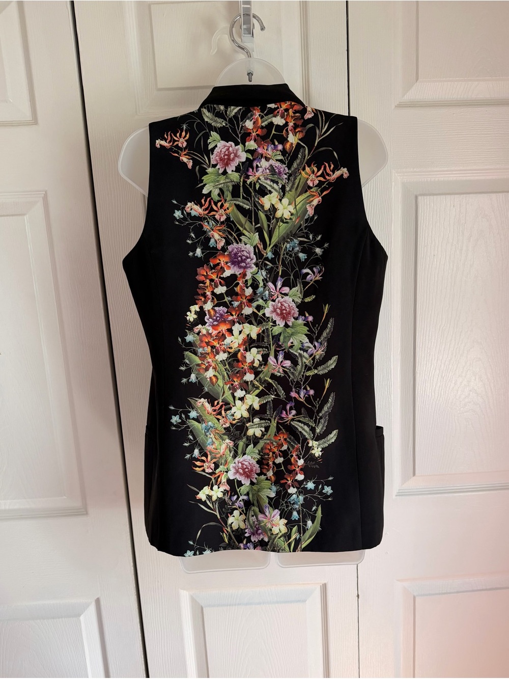 Mural Black Sleeveless vest with Multicolor Floral Back.